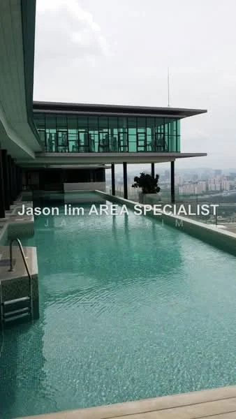 Exterior type: high-rise condominium; features: infinity pool, pool deck with loungers, glass curtain wall facade, modern architectural design, surrounded by city skyline, multiple levels, landscaped area; style: modern.