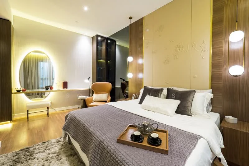 Bedroom features: king-size bed with white bedding, decorative throw pillows, wooden bedside table, table lamp with round shade, wall-mounted mirror with LED backlighting, accent wall with floral design, wood paneling, recessed ceiling lights, large window with city view, armchair in orange fabric, dressing table with chair, decorative tray with cups, wooden flooring, area rug; style: modern; view: city.