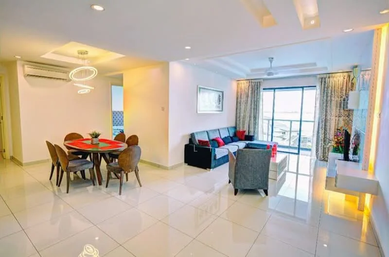 Living features: grey L-shape sectional sofa, 2-seater fabric sofa, round dining table with red and black accents, 4 upholstered dining chairs, white wall-mounted TV console, decorative wall with LED lighting, floor-to-ceiling windows, sheer curtains, recessed downlights, 5-blade ceiling fan, glossy white tile flooring, decorative artwork on wall, potted plants; style: modern; view: city.