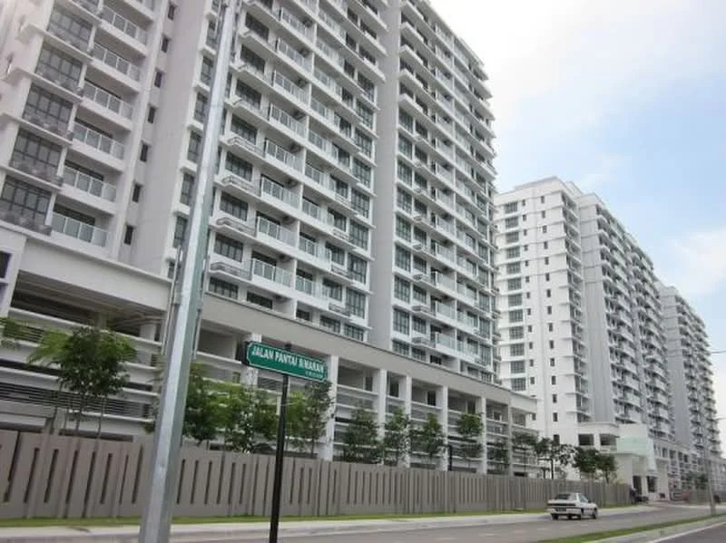 Exterior type: high-rise condominium; features: glass curtain wall, white painted facade, recessed balconies, multiple storeys, landscaped greenery at base, street view, signage visible, parking area underneath; style: modern.