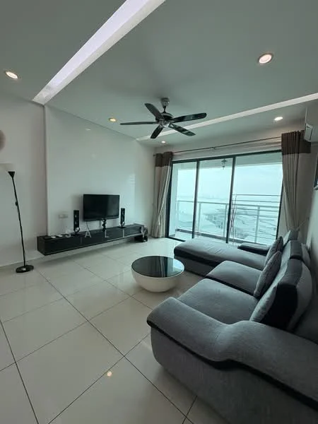 Living features: grey L-shape sectional sofa, white round coffee table, black TV console, wall-mounted TV, floor-to-ceiling sliding glass door, curtains, 5-blade ceiling fan with light, recessed downlights, white painted walls, glossy white tile flooring; style: modern; view: sea.