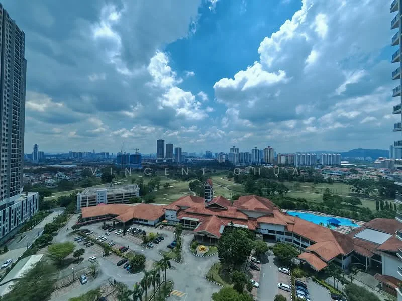 Exterior type: high-rise condominium; features: red tiled roof, multiple storey buildings, landscaped garden, swimming pool visible, parking lot, surrounding greenery, city skyline in background, cloudy sky; style: modern.