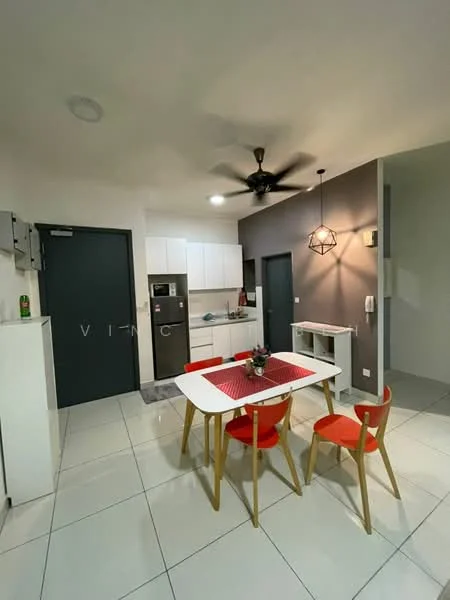 Dining features: white painted walls, grey accent wall, glossy white floor tiles, 5-blade ceiling fan with light, dining table with red placemat, 4 wooden dining chairs with red upholstery, built-in kitchen cabinetry, stainless-steel fridge, countertop with sink, wall-mounted light fixture; style: modern. Kitchen features: white cabinetry, stainless-steel appliances, countertop with sink; style: modern.