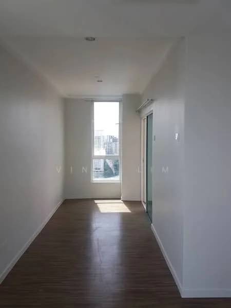 Room features: white painted walls, laminate flooring, large window with city view, natural light streaming in, sliding glass door, ceiling lights; style: modern; view: city.