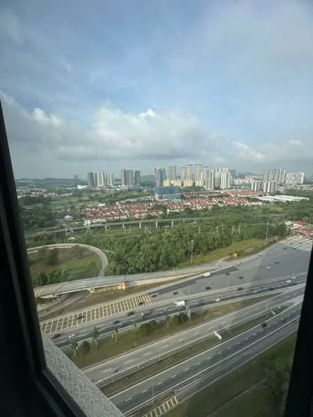 Exterior type: high-rise condominium; features: city skyline view, surrounded by greenery, highway visible, urban landscape, multiple high-rise buildings, residential area in foreground; style: modern.
