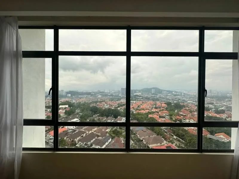 Room features: floor-to-ceiling windows, city skyline view, curtains, grey cloudy sky; view: city.