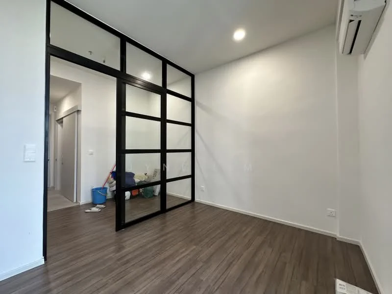 Room features: wooden flooring, white painted walls, black framed glass partition, recessed downlights, wall-mounted split AC, corner with door leading to hallway, minimalist design, natural light from windows; style: modern.