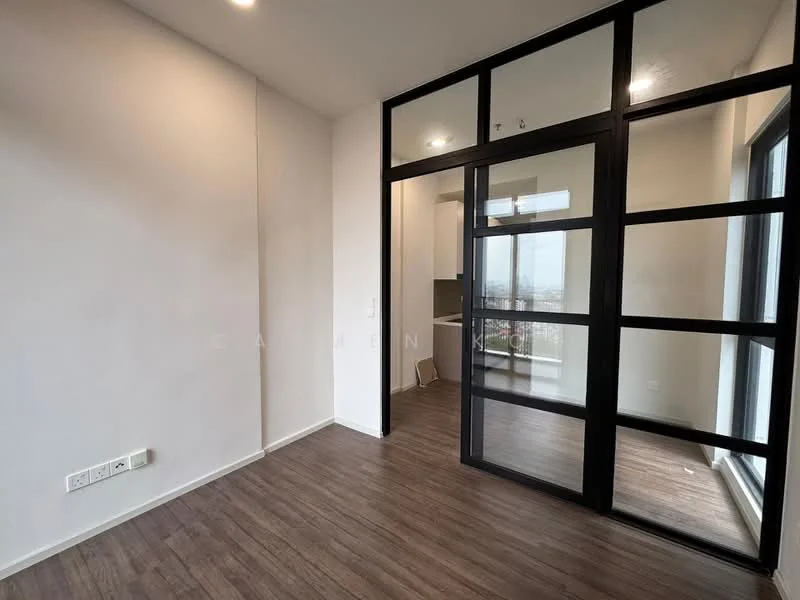 Room features: light wood laminate flooring, white painted walls, black framed glass partition, large windows with city view, recessed ceiling lights, electrical outlets on wall, minimalist design; style: modern; view: city.