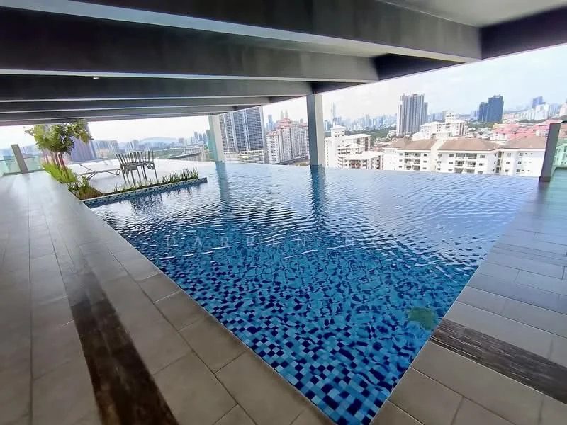 Exterior type: swimming pool deck; features: infinity pool with mosaic tile, pool deck with loungers, surrounding city skyline view, glass railing, landscaped area with greenery, concrete flooring, modern architectural design; style: modern.