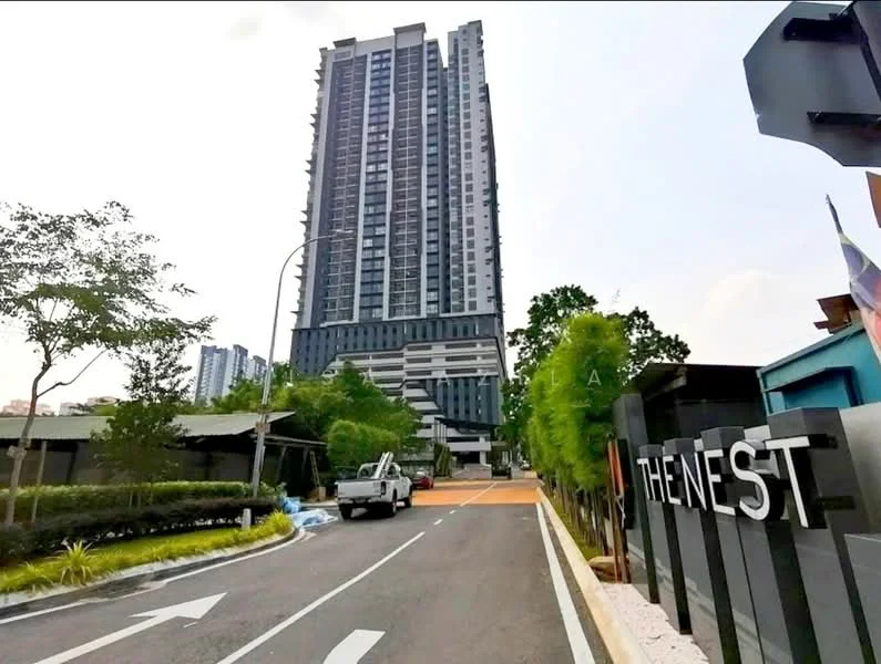 Exterior type: high-rise condominium; features: glass curtain wall, projecting balconies, landscaped entrance, manicured lawn, surrounded by mature greenery, driveway with interlocking pavers, signage with 'THE NEST', multiple storeys, urban context; style: modern.