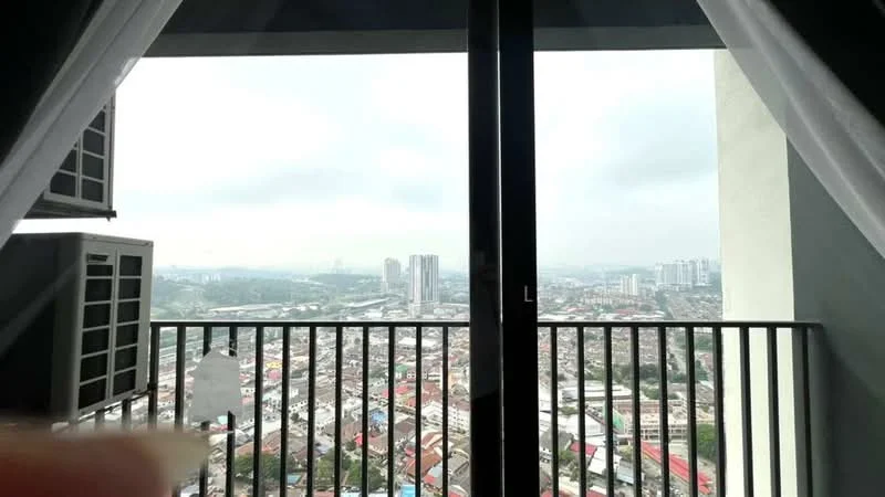 Room features: floor-to-ceiling windows, black railing, curtains, city skyline view; view: city.