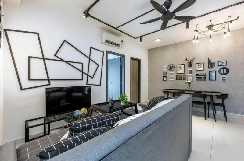 Living features: 3-seater fabric sofa in grey, black and white patterned throw pillows, wall-mounted TV, black TV console, decorative wall art with geometric frames, exposed ceiling beams, 5-blade ceiling fan with light, recessed downlights, dining table with black chairs, decorative wall with framed photos, white walls, light grey accent wall, white tiled flooring, indoor plant in ceramic pot; style: modern.