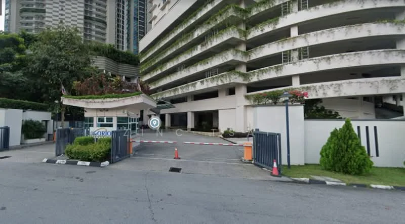 Exterior type: high-rise condominium; features: guard house at entrance, gated entry, landscaped greenery, paved driveway, security boom gate, multiple-storey building, balconies with greenery, surrounded by mature trees; style: modern.