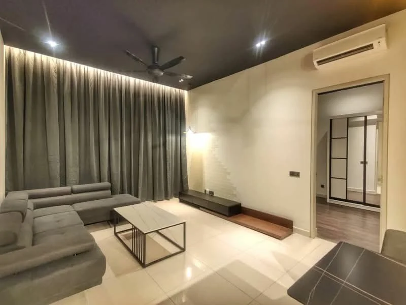 Living features: L-shape sectional sofa in grey, coffee table with metal frame, wall-mounted TV console, recessed downlights, 5-blade ceiling fan, cream painted walls, grey curtains, tile flooring, air conditioning unit on wall, wooden flooring visible in adjacent room; style: modern.