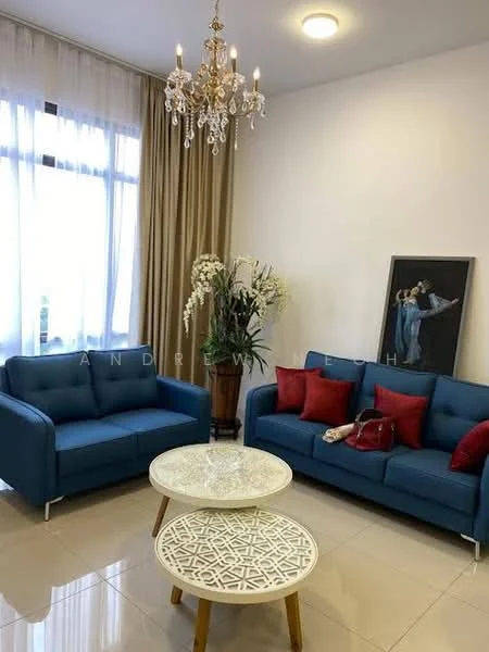 Living features: two blue fabric sofas, decorative red cushions, round coffee table with intricate design, chandelier with crystals, white walls, cream curtains, large window with sheer curtains, framed artwork on wall, potted plants; style: modern.