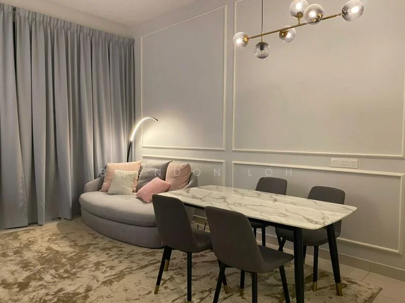 Dining features: round marble dining table, 4 grey upholstered dining chairs, curved grey sofa, decorative cushions in pink, floor-to-ceiling curtains in light grey, wall paneling with white trim, soft beige area rug, modern pendant light with glass bulbs; style: modern.