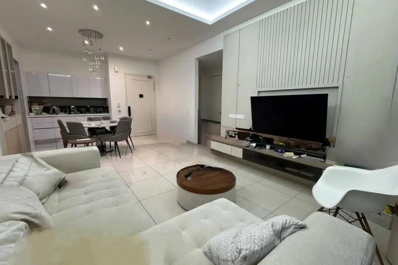 Living features: light-colored fabric sofa, round wooden coffee table, wall-mounted TV, TV console with storage, recessed ceiling lights, tray ceiling with LED lighting, white walls, large floor tiles, decorative wall paneling, dining table with chairs visible in background, white accent chair; style: modern.