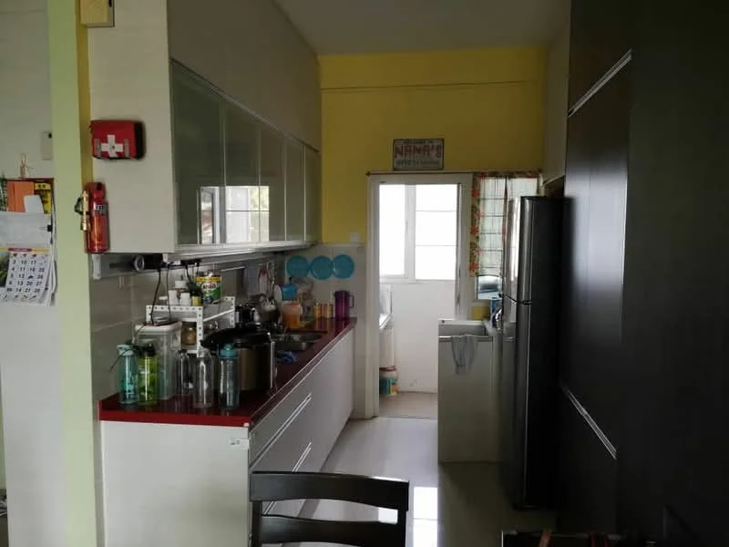 Kitchen features: white cabinetry with glass-front upper cabinets, red countertop, stainless-steel fridge, built-in washing machine, ceramic tile flooring, yellow painted walls, window with sheer curtains, kitchen sink, various kitchen appliances, open shelving, wall-mounted calendar, kitchen utensils on countertop; style: modern.