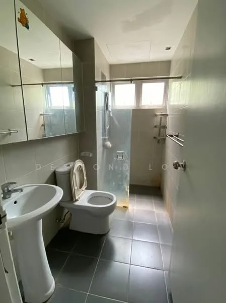 Bathroom features: white ceramic toilet, chrome basin mixer faucet, single-sink vanity with white cabinet, framed mirror, walk-in shower with glass enclosure, rain shower head, grey tile flooring, light grey wall tiles, window for natural light, towel bar, shower caddy, glass shower screen; style: modern.