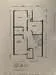 Floor plan: 2-bedroom 1-bathroom unit; features: open-plan kitchen-dining-living, master bedroom with ensuite bathroom, bedroom 2 with shared bathroom, utility room, balcony off living room, central foyer, 1 car porch.