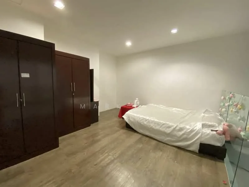 Bedroom features: queen-size bed with white bedding, dark wood wardrobe with sliding doors, laminate flooring, white painted walls, recessed downlights, decorative glass display case, plush toys on bed, small bedside table with red cloth; style: modern.