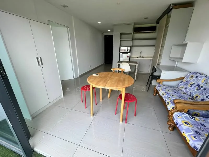 Living features: grey tiled flooring, white painted walls, ceiling lights, wooden dining table, 2 red stools, blue patterned sofa, built-in cabinets, microwave, kitchenette with countertop, open layout, sliding glass door to balcony; style: modern; view: garden.