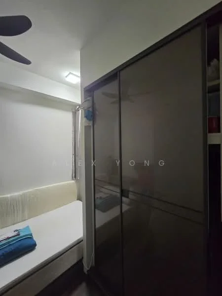 Room features: single bed, upholstered headboard, built-in wardrobe with sliding doors, ceiling fan, white walls, dark wood flooring, window with sheer curtains, bedside table; style: modern.