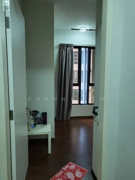 Room features: wooden flooring, white painted walls, floor-to-ceiling window, grey curtains, ceiling light, small side table, toiletries on table, doorway leading to another room, pink patterned mat; style: modern.