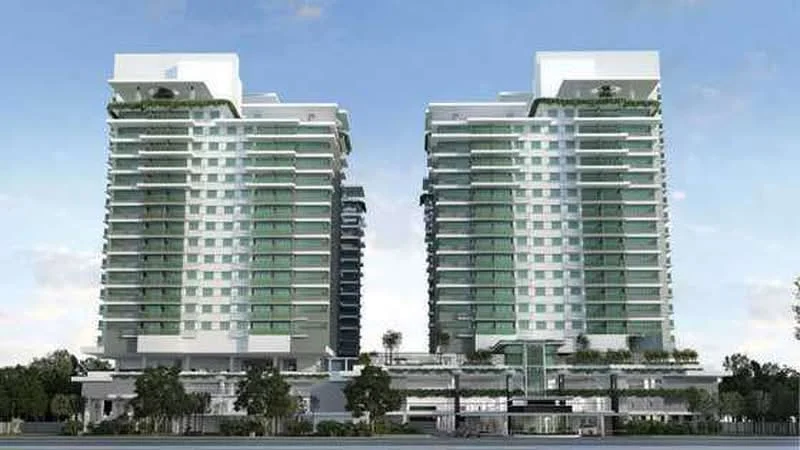 Exterior type: high-rise condominium; features: glass curtain wall, white painted facade, recessed balconies, greenery on balconies, multiple storeys, landscaped ground level, modern architectural design, surrounded by trees, open-air parking area; style: modern.