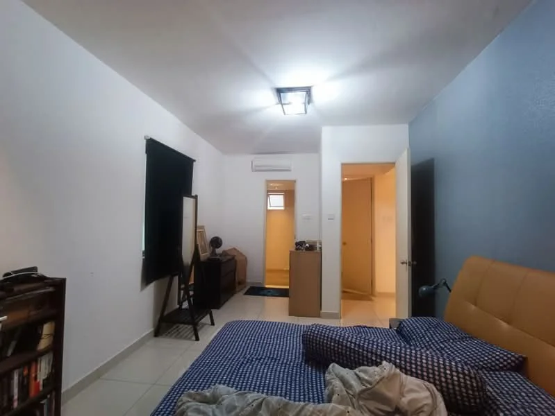 Bedroom features: queen-size bed with brown leather headboard, blue checkered bedding, white painted walls, grey accent wall, tile flooring, 1 wall-mounted split AC, ceiling light fixture, black curtain, wooden bookshelf, dressing table, mirror, doorway leading to bathroom, doorway leading to hallway; style: modern.