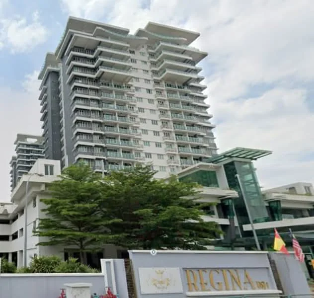 Exterior type: high-rise condominium; features: glass curtain wall, white painted facade, greenery landscaping, multiple balconies, modern architectural design, main entrance with signage, surrounded by mature trees; style: modern.