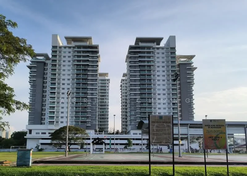 Exterior type: high-rise condominium; features: glass curtain wall, white painted facade, balconies on upper floors, two towers connected at the base, surrounded by landscaped greenery, basketball court visible in foreground, open parking area, street lighting, manicured lawn; style: modern.
