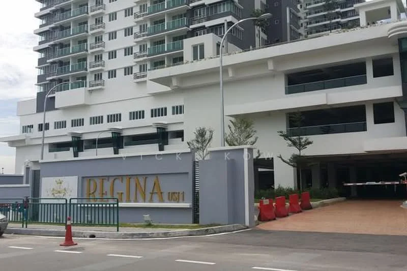 Exterior type: high-rise condominium; features: glass curtain wall, white painted facade, recessed balconies, landscaped entrance, manicured greenery, driveway with interlocking pavers, guard house at entrance, covered parking, multiple storeys, modern architectural design; style: modern.
