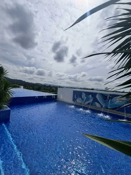Exterior type: swimming pool deck; features: infinity pool, blue water, water features with fountains, surrounded by tropical landscaping, palm trees, skyline view in background, cloudy sky; style: modern.