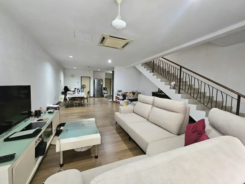 Living features: light-coloured fabric L-shape sectional sofa, coffee table, wall-mounted TV, TV console, wooden flooring, ceiling fan, recessed downlights, open layout, staircase in background, air conditioning unit, decorative items on shelves; style: modern.