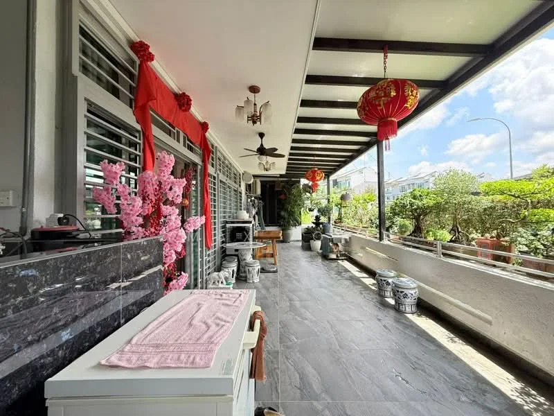 Room features: grey stone flooring, white walls, sliding glass doors, ceiling fan, decorative lanterns, pink cherry blossom decorations, outdoor dining area, planters with greenery, decorative ceramic pots, overhead beams, natural light from windows, open layout; style: modern; view: garden.