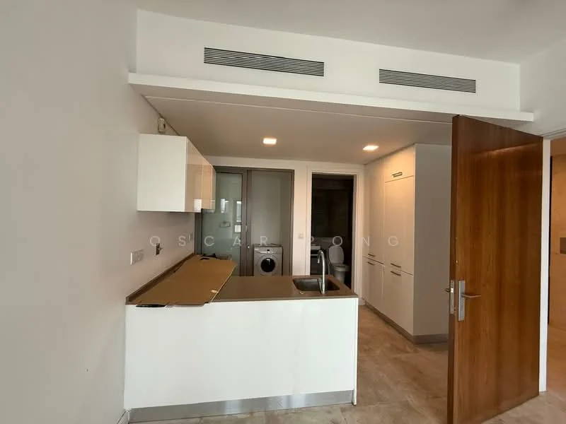 Kitchen features: white cabinetry, granite countertop, single-bowl stainless-steel sink, chrome pull-down faucet, built-in oven, freestanding washing machine, tile flooring, recessed downlights, open layout, neutral wall color, sliding glass door, ventilation system; style: modern.