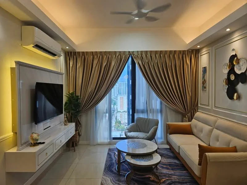 Living features: sofa with beige upholstery, accent chair in light grey, round coffee table with glass top, TV console with white finish, wall-mounted flat-screen TV, curtains in gold and cream, ceiling fan, recessed lighting, decorative wall art, area rug with abstract pattern, potted plant; style: modern; view: city.