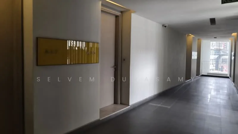Room features: grey tiled flooring, white painted walls, recessed lighting, door with modern handle, numbered door signage, wide corridor, natural light from windows, minimalist design; style: modern.