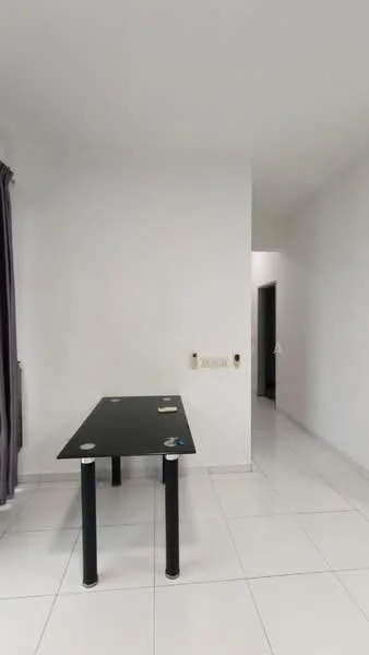 Room features: white painted walls, white tiled flooring, black table with four legs, curtains in dark color, doorway leading to another room.