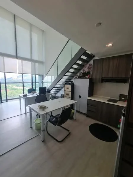Study features: large floor-to-ceiling windows, glass railing staircase, white desk, black office chair, dark wood cabinetry, white refrigerator, kitchenette area, light wood flooring, recessed ceiling lights; style: modern; view: garden.