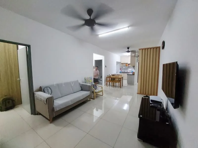 Living features: 3-seater fabric sofa in light grey, wooden armchair, wall-mounted TV, black TV console, ceiling fan with light, recessed lighting, white painted walls, glossy tile flooring, decorative wall clock, open layout to dining area, dining table visible in background; style: modern. Room features: doorway leading to another room, kitchen visible in background.