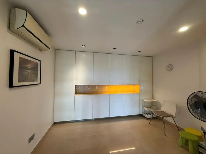 Living features: wall-mounted split AC, white cabinetry with integrated lighting, cream painted walls, tile flooring, recessed downlights, wall clock, framed artwork, fan, small white side table, green stool; style: modern.