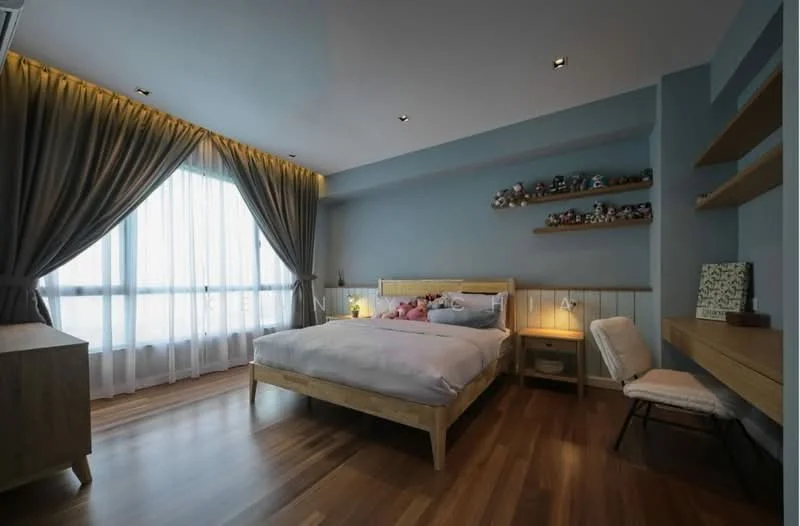 Bedroom features: king-size bed with white bedding, wooden bed frame, wooden bedside table, table lamp on bedside table, built-in wooden shelving, large window with sheer curtains, wooden flooring, decorative plush toys on bed, wall-mounted artwork, recessed ceiling lights, accent wall in light blue, upholstered chair; style: modern; view: city.