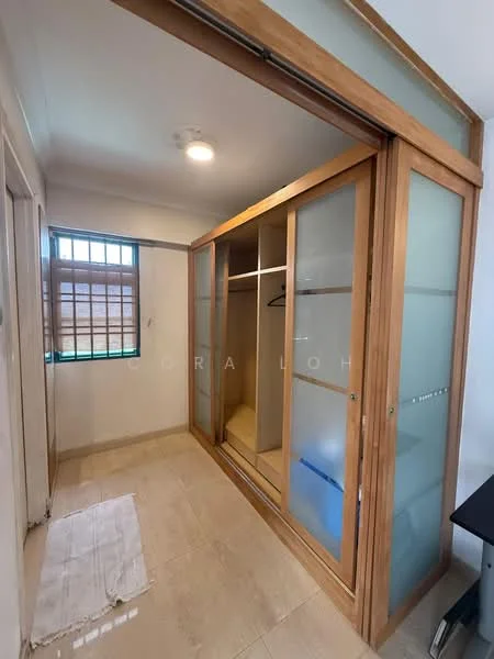Room features: glass sliding wardrobe with wooden frame, tile flooring, white walls, window with metal grille, ceiling light fixture, built-in shelving, neutral color scheme, corner space; style: modern.