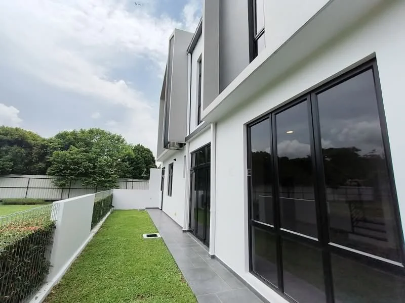 Exterior type: detached bungalow; features: white painted facade, grey accent wall, flat roof, manicured lawn, paved walkway, large windows, air conditioning unit visible, surrounded by greenery; style: modern.