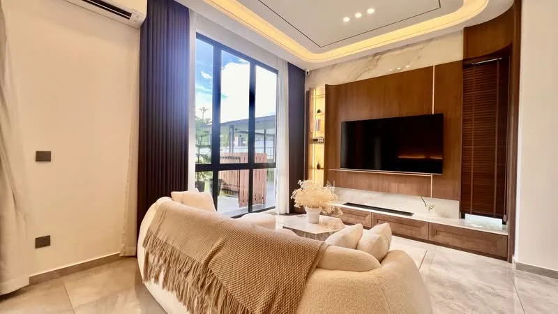 Living features: cream fabric sofa, decorative throw blanket, coffee table, wall-mounted TV, wood feature wall, recessed lighting, tray ceiling with integrated lights, floor-to-ceiling windows, curtains, grey tiled flooring, decorative plant, built-in cabinetry; style: modern; view: garden.