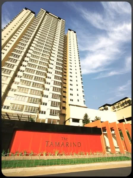 Exterior type: high-rise condominium; features: glass curtain wall, cream painted facade, recessed balconies, approximately 20-storey high-rise, landscaped entrance with signage, modern architectural design; style: modern.