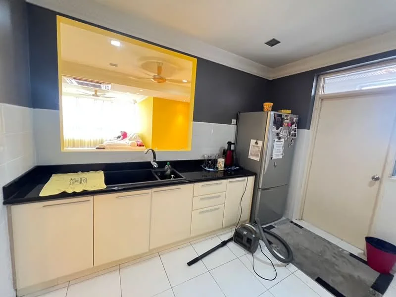 Kitchen features: black granite countertop, cream cabinetry, single-bowl stainless-steel sink, chrome pull-down faucet, stainless-steel fridge, white tiled backsplash, white tiled flooring, ceiling fan, wall-mounted mirror, door leading to outside, vacuum cleaner on floor; style: modern.