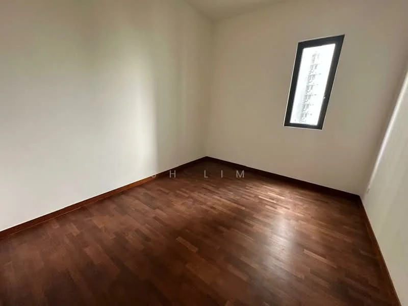 Room features: wooden flooring, white painted walls, single window, no visible furniture, corner room, natural light, neutral color scheme.
